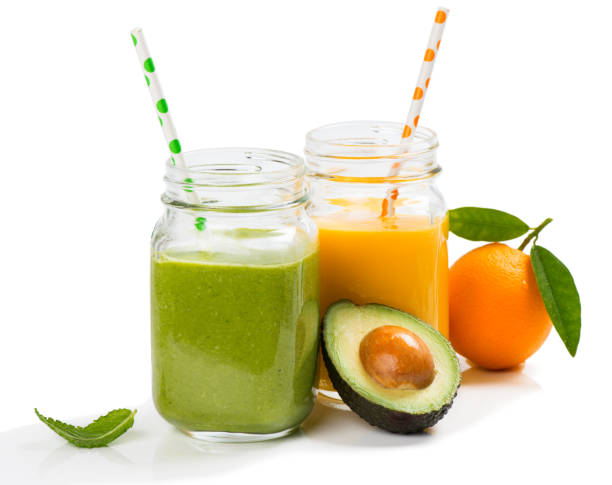 istock Green and orange organic smoothies 658673192