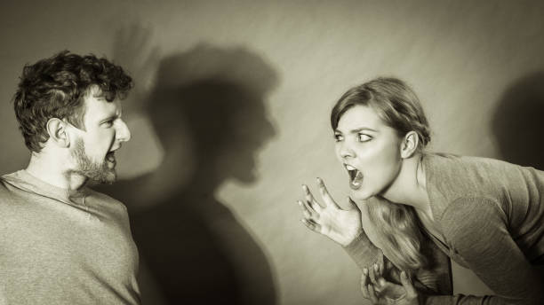 istock People in fight. Young couple arguing. 658688802