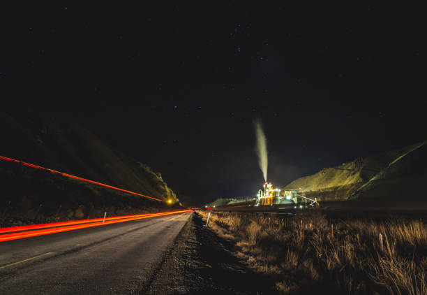 Concrete Plant Near Highway at Night