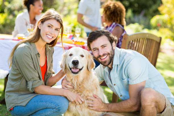 istock Smiling couple with the dog 658789878