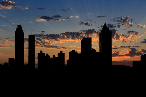 The Silhouette of Atlanta Skyline with the clouds