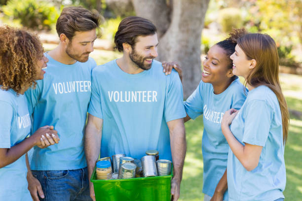 istock Group of volunteer holding box 658814480