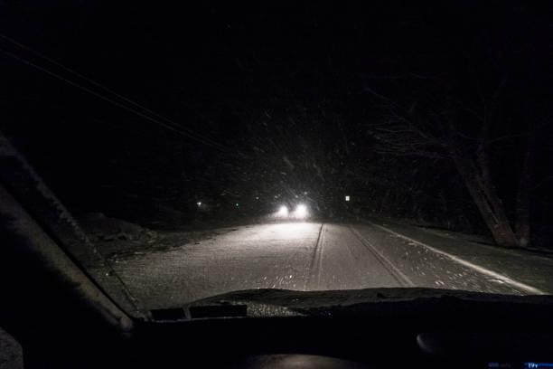 Midnight Car Driver POV Through Blizzard Snow Storm Windshield
