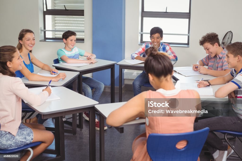 Student Subject Students Studying In Classroom Stock Photo - Download Image Now ...