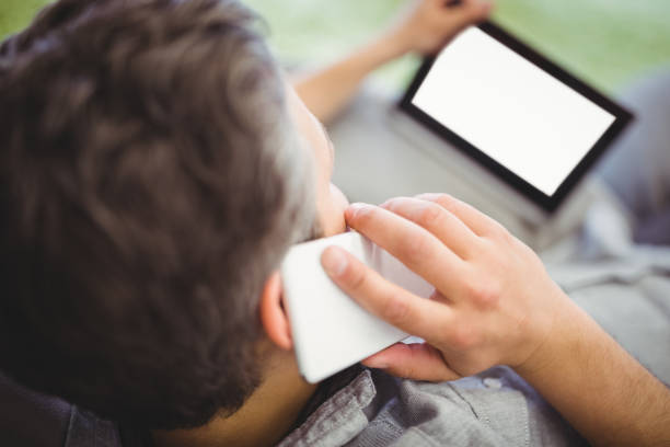 istock Businessman using digital tablet and mobile phone at creative office 658829686