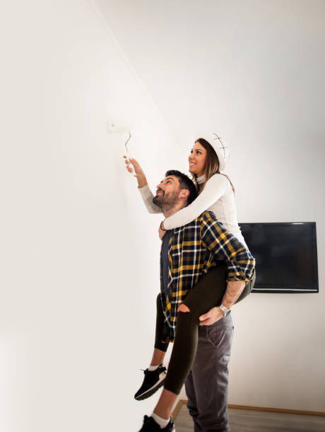 istock Couple decoration their apartment 658846444