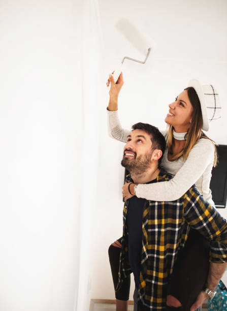 istock Couple decoration their apartment 658846674