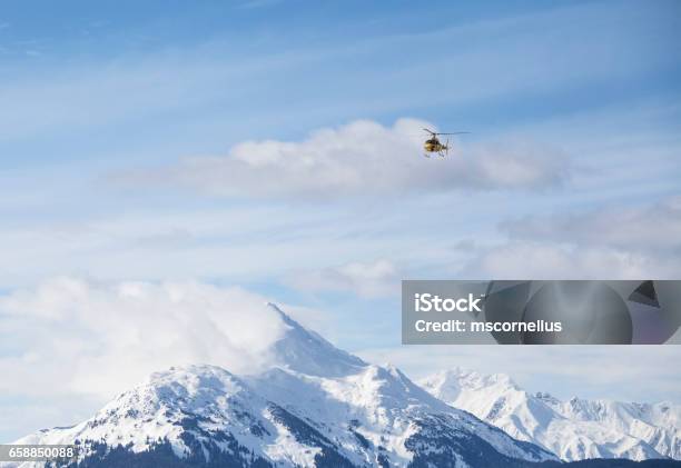 Helicopter Over Mountains Stock Photo - Download Image Now - Alaska - US State, Heli-Skiing, Helicopter