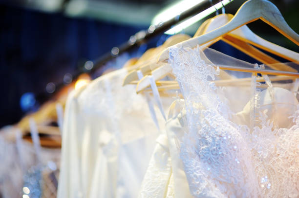 istock A few beautiful wedding dresses on a hanger. 658854844