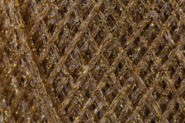 istock background of many string in golden colors 658861598