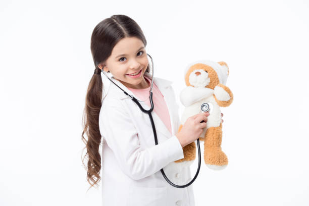 istock Little girl playing doctor 658862898