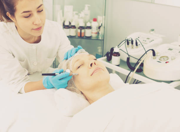 istock Mature woman having beauty procedures 658863308