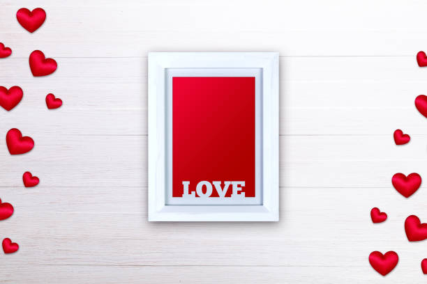 istock Blank photo frame. Red satin hearts. Love design. 658863358