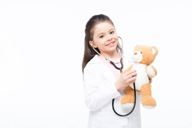 istock Girl in doctor costume 658864562