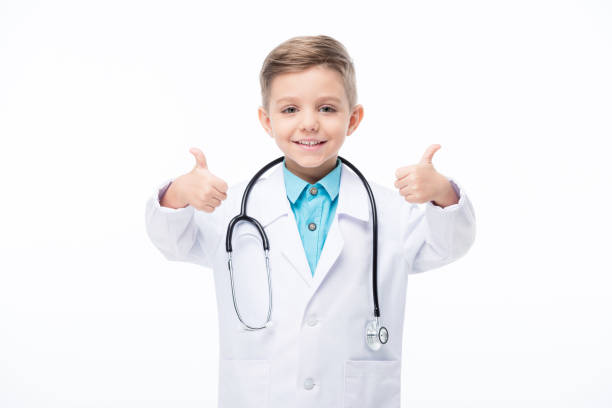 istock Boy in doctor costume 658867892