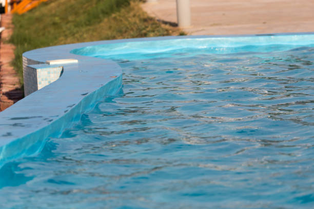 istock Outdoor pool with blue water 658870406