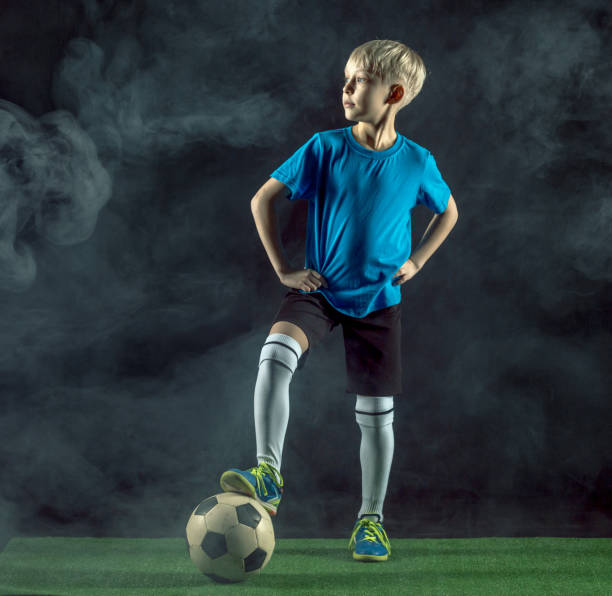 サッカー少年の成長した肖像画 ストックフォト