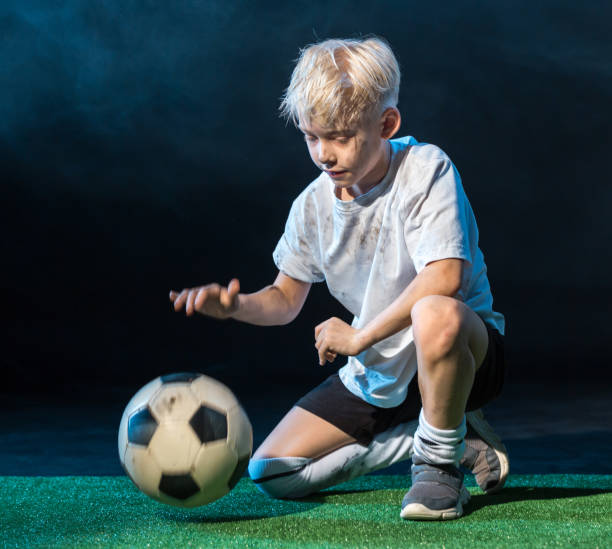 istock Young Football Player 658871330