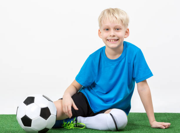 istock Happy Young Football Player 658871376