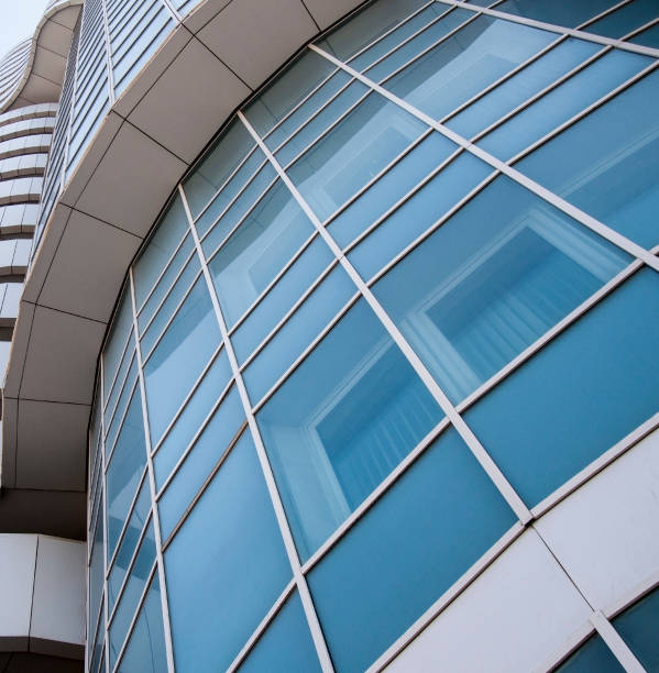 istock Close up of blue modern office building. 658876146