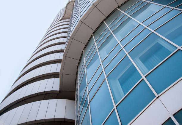 istock Close up of blue modern office building. 658876154