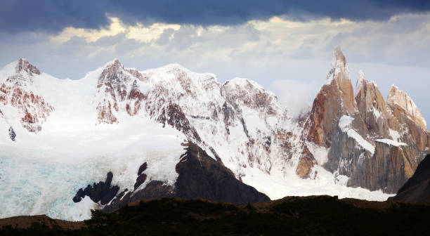 Glaciers and mountains Fitz Roy, Cerro Torre Views of snow peaks of Andes mountains in summer day, Santa Cruz, Argentina, South America foothills parkway photos stock pictures, royalty-free photos & images