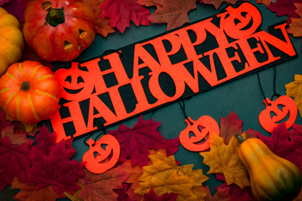 istock Autumn harvest and Happy Halloween sign 658893414