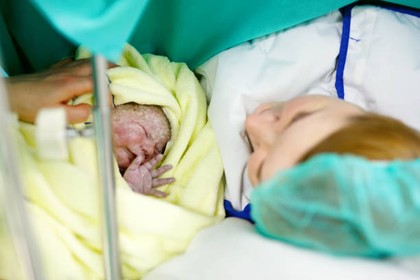 istock Mother looking for first ime her baby being born via Caesarean Section 658893612