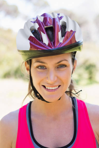 istock Fit smiling woman wearing helmet 658894450