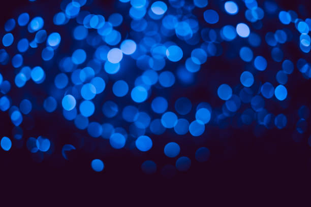 istock Colorful circle lights bokeh on dark background 658894536
