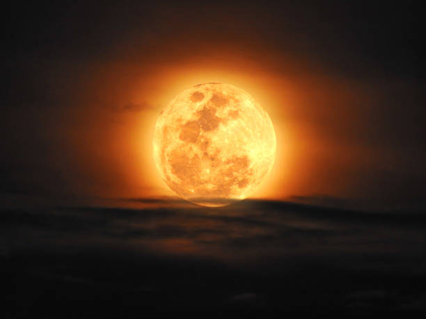 istock The yellow full moon and cloud on night sky 658896182