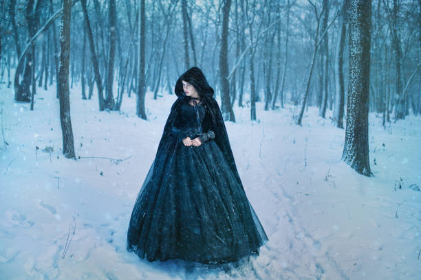 istock Mysterious woman in black 658897490