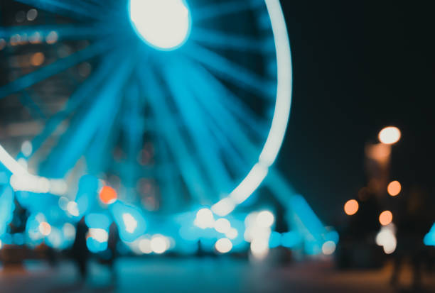 Abstract blur image of people walking in night street
