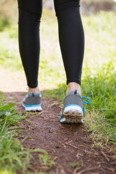 istock Close-up of woman walking 658902302