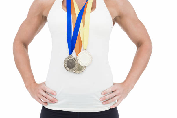 istock Female athlete wearing medals 658902962