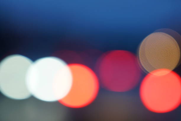 istock Night city street lights bokeh background 658905498