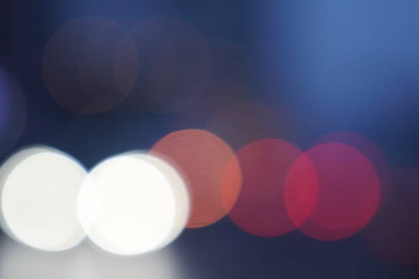 istock Night city street lights bokeh background 658905692