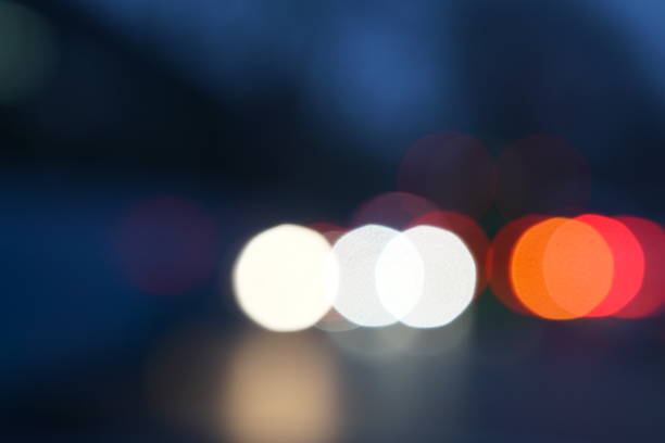 istock Night city street lights bokeh background 658906442
