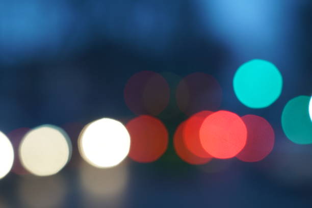 istock Night city street lights bokeh background 658906518