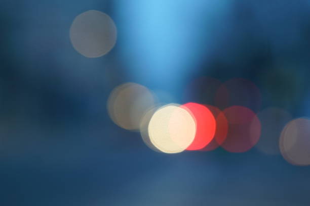 istock Night city street lights bokeh background 658906574