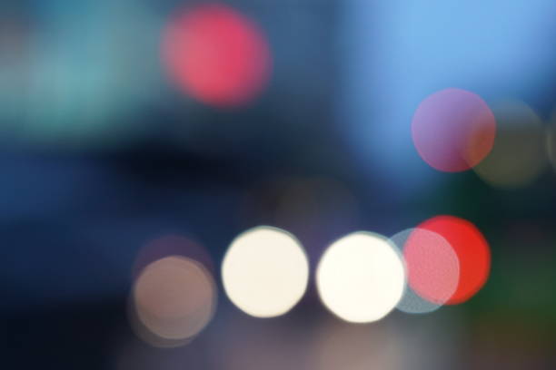 istock Night city street lights bokeh background 658906592