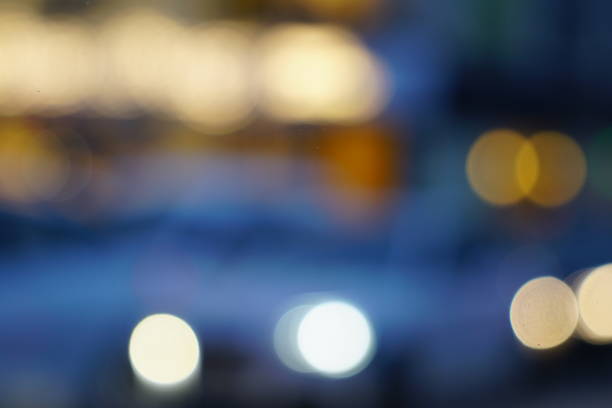 istock Night city street lights bokeh background 658906756
