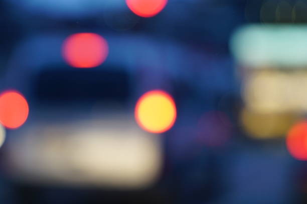 istock Night city street lights bokeh background 658906778