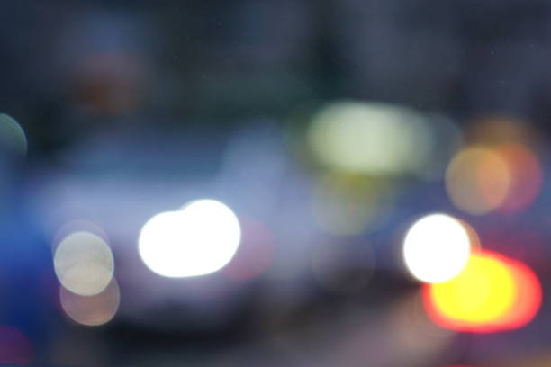 istock Night city street lights bokeh background 658906836