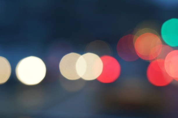 istock Night city street lights bokeh background 658906970