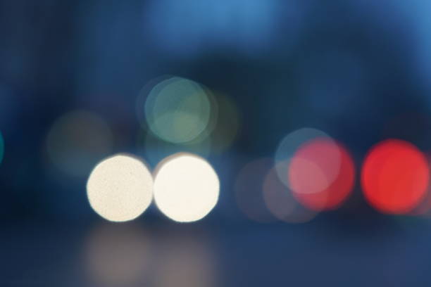 istock Night city street lights bokeh background 658907086