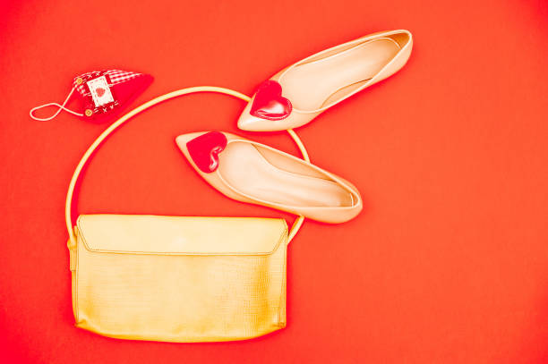 istock Lovely Beige Outfit On Orange Background - Directly Above 658913034