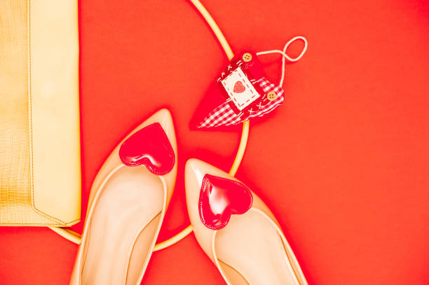 istock Lovely Beige Outfit On Orange Background - Directly Above 658913042