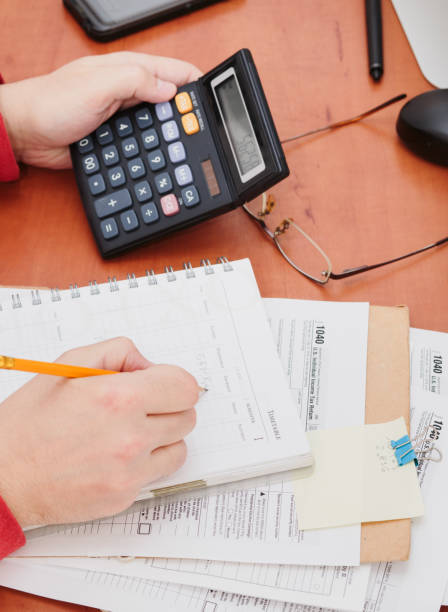 istock Time to fill individual income tax return form 658920978