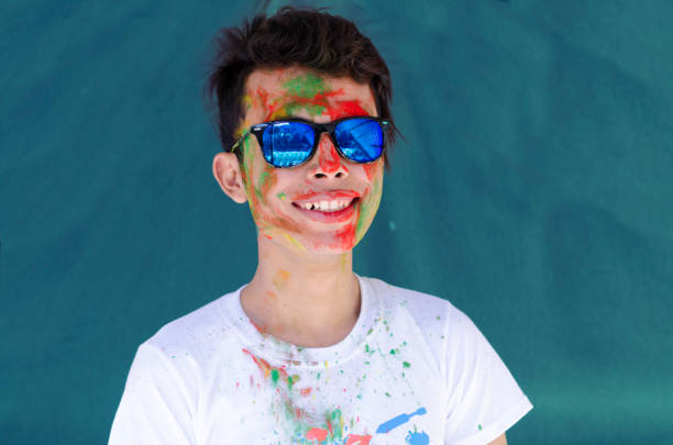istock Young male with colors in face 658922798